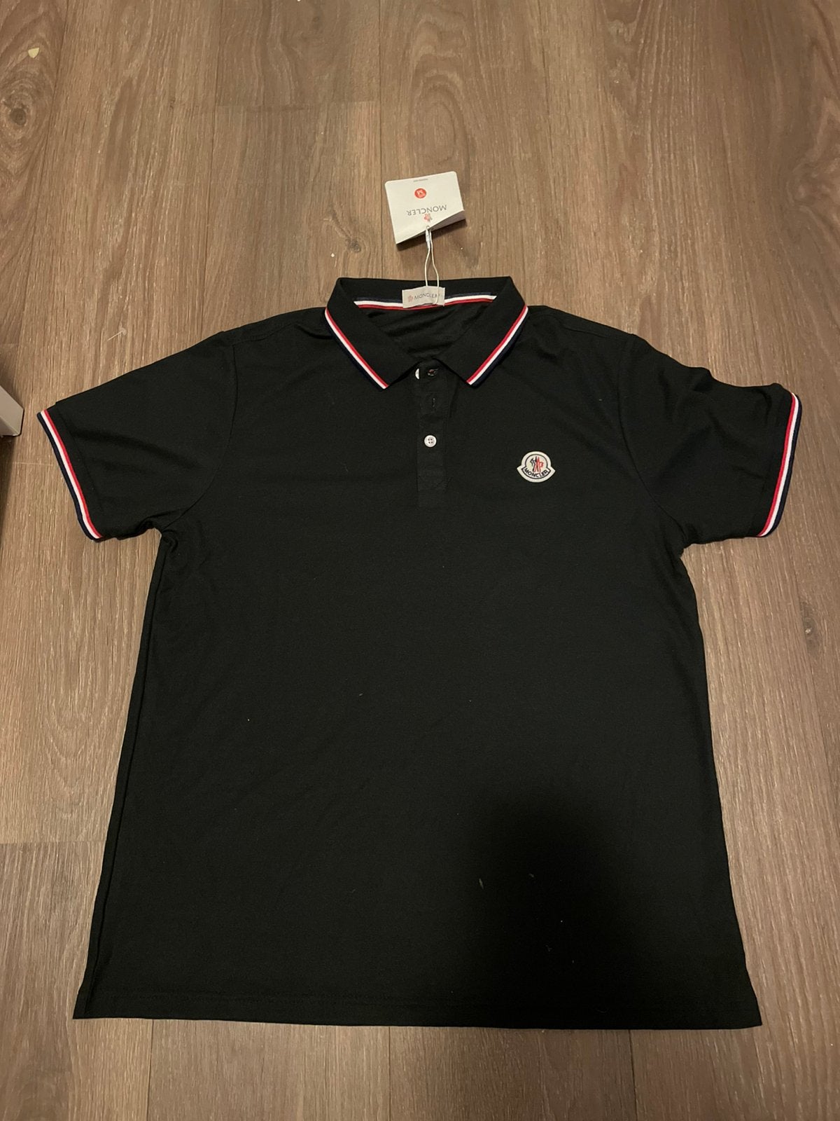 Moncler polo maat m, Ophalen of Verzenden, Zo goed als nieuw, Zwart