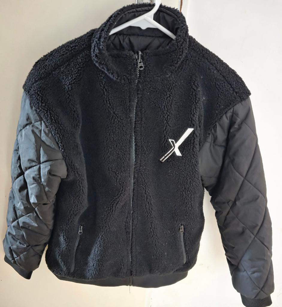 Zwarte Touzani x Retour omkeerbare jas, Kinderen en Baby's, Kinderkleding | Maat 164, Ophalen of Verzenden, Zo goed als nieuw