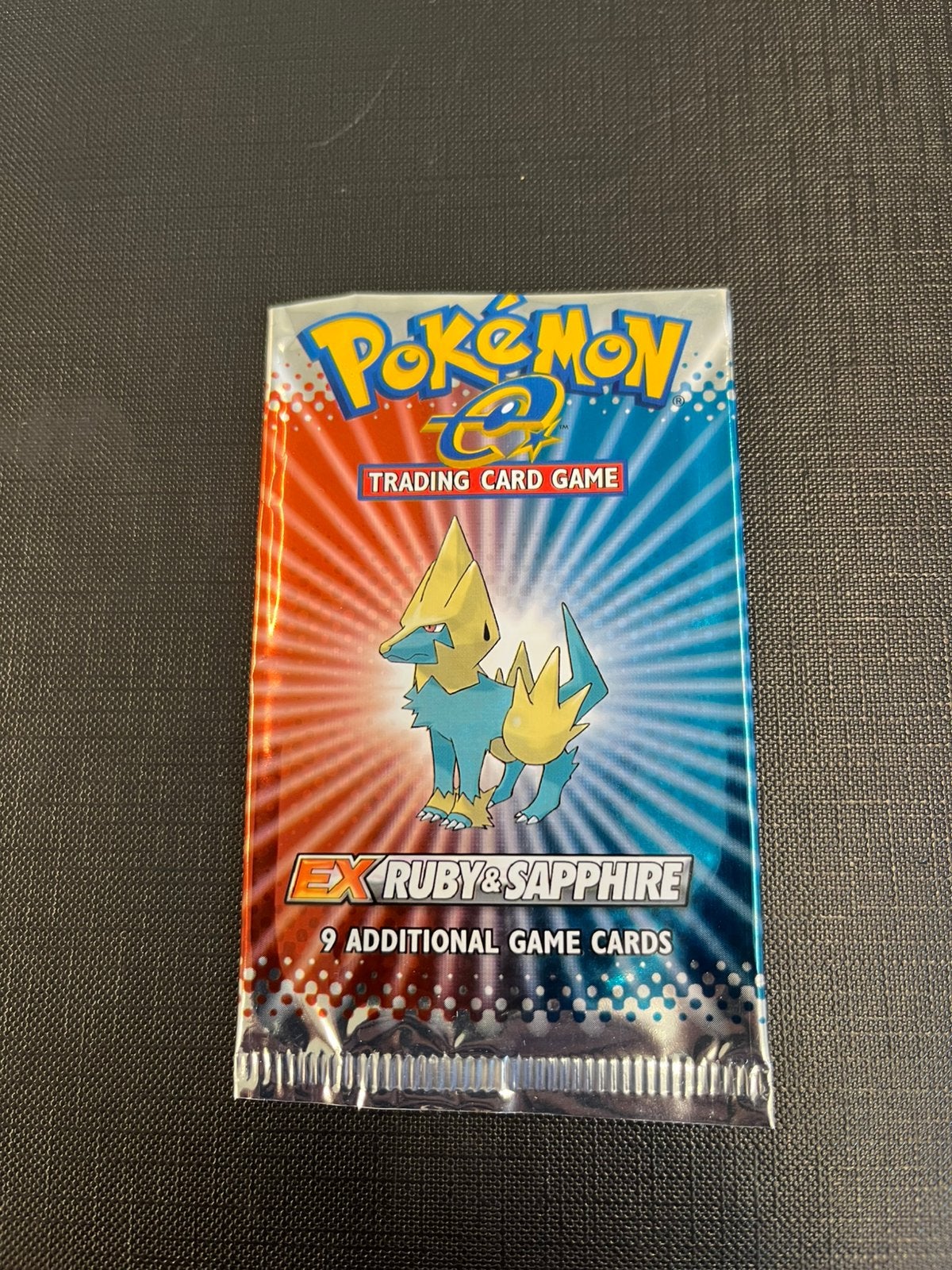 Pokemon booster empty EX ruby and sapphire manectric, Ophalen of Verzenden, Zo goed als nieuw, Booster