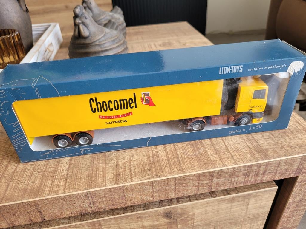 Daf oplegger  nutricia chocomelk, Hobby en Vrije tijd, Modelauto's | 1:50, Nieuw, Bus of Vrachtwagen, Lion Toys, Ophalen of Verzenden