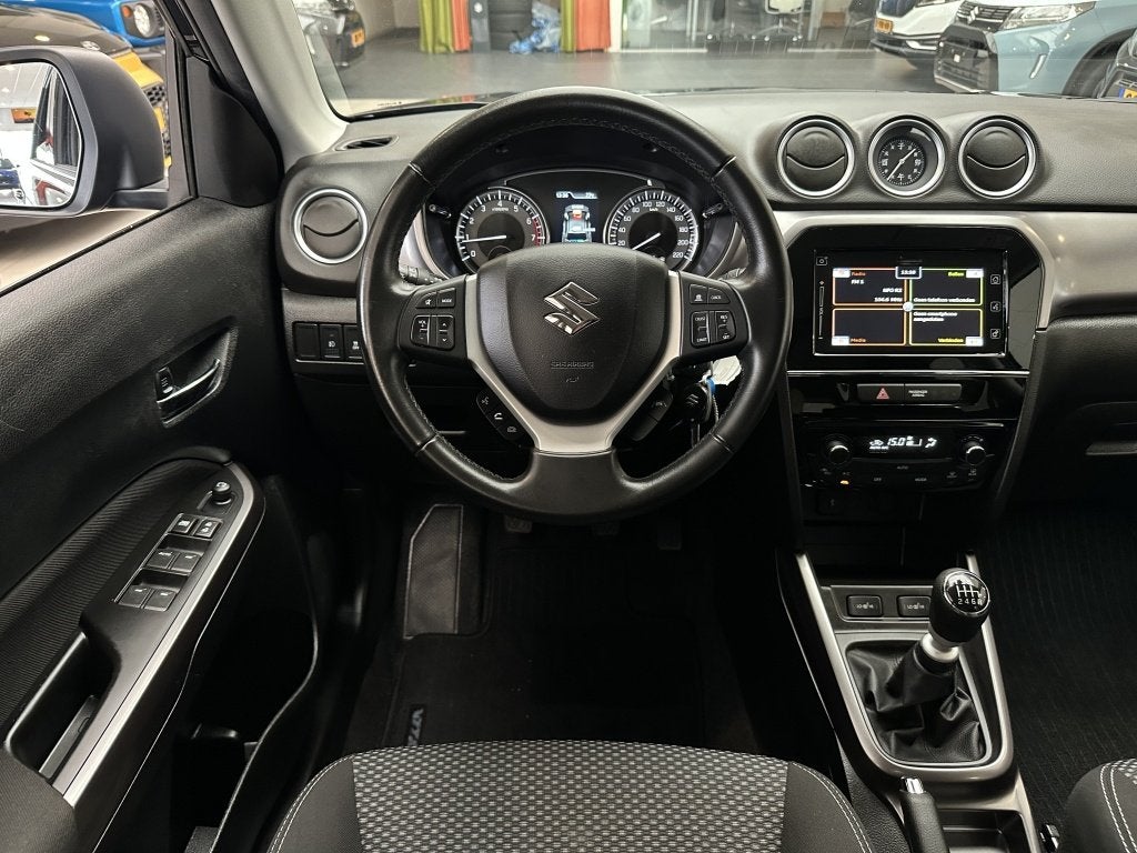 Suzuki Vitara 1.4 Style Hybrid [ 1e EIGENAAR I DEALER OH I T, Auto's, Gebruikt, 4 cilinders, Blauw, 49 €/maand