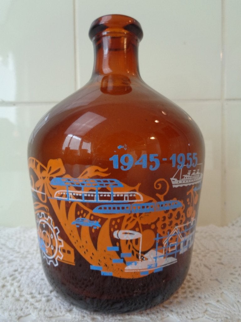 Herinneringsfles 1945 - 1955 i.v.m. 10 jaar bevrijding, Ophalen