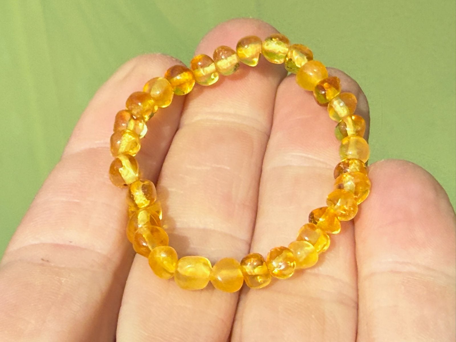 Barnsteen armband enkelbandje baby, Ophalen of Verzenden, Mineraal