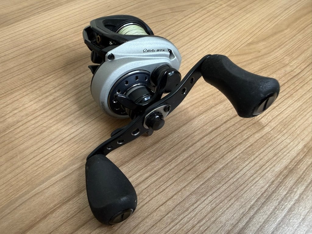Abu Garcia Revo STX-L Baitcaster 6.4:1 Linkshandig, Molen, Ophalen of Verzenden, E, E