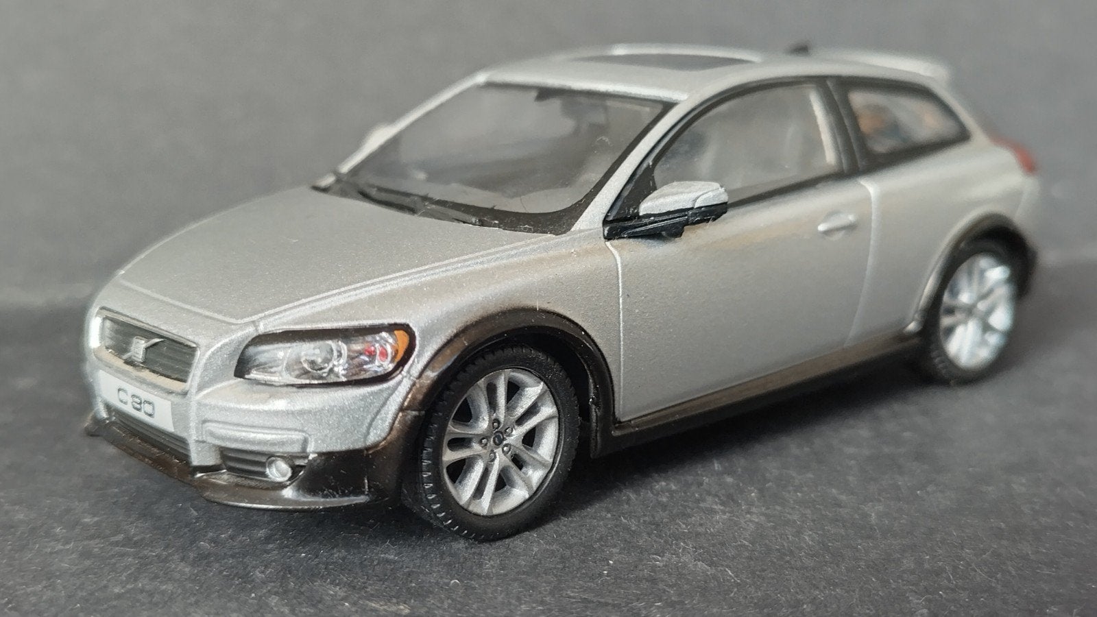 Volvo C30 1:43 Cararama Pol, Hobby en Vrije tijd, Modelauto's | 1:43, Zo goed als nieuw, Auto, Overige merken, Ophalen of Verzenden