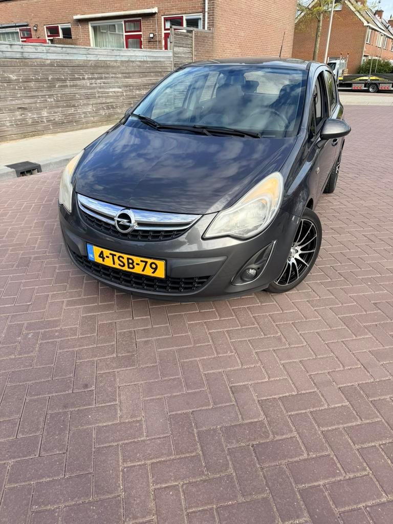 Opel Corsa 1.2 5-deurs uit 2012, Ophalen, Gebruikt, Opel