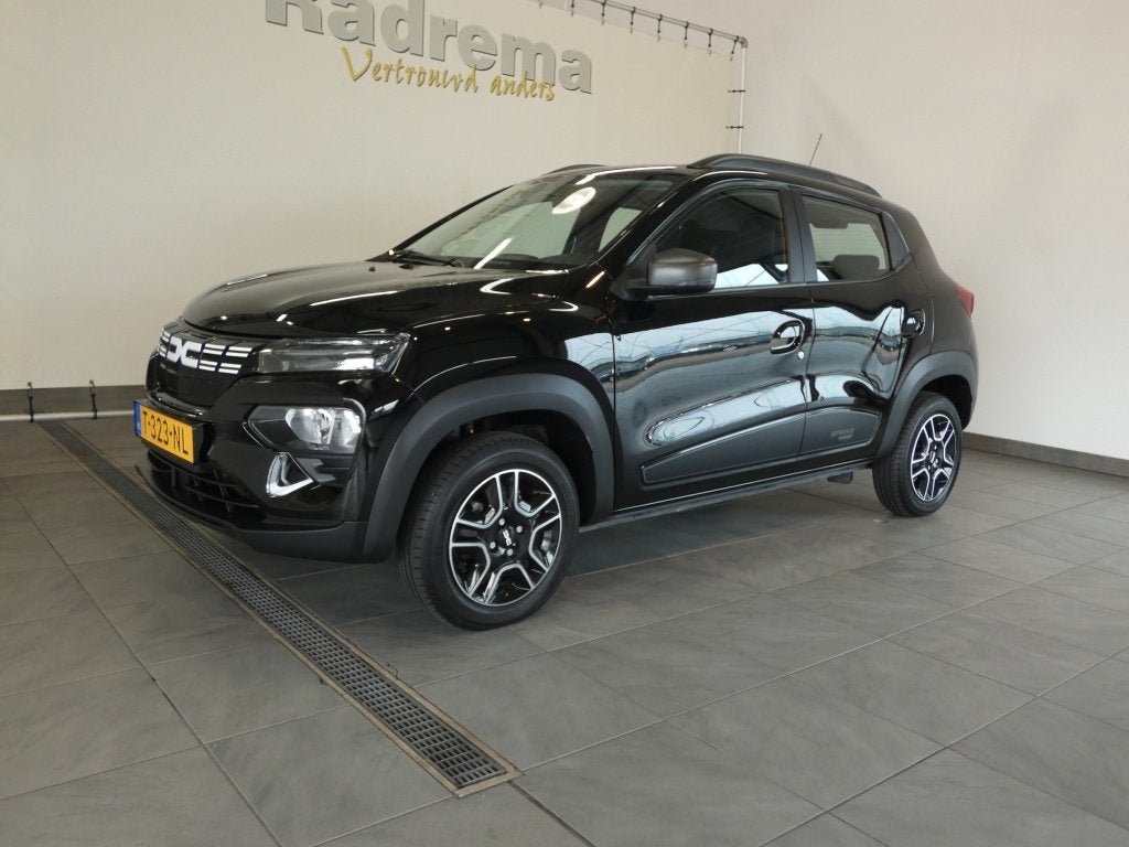 Dacia SPRING ELECTRIC Expression Navi en Camera (bj 2023), Auto's, Automaat, Dealer onderhouden, Gebruikt, Zwart
