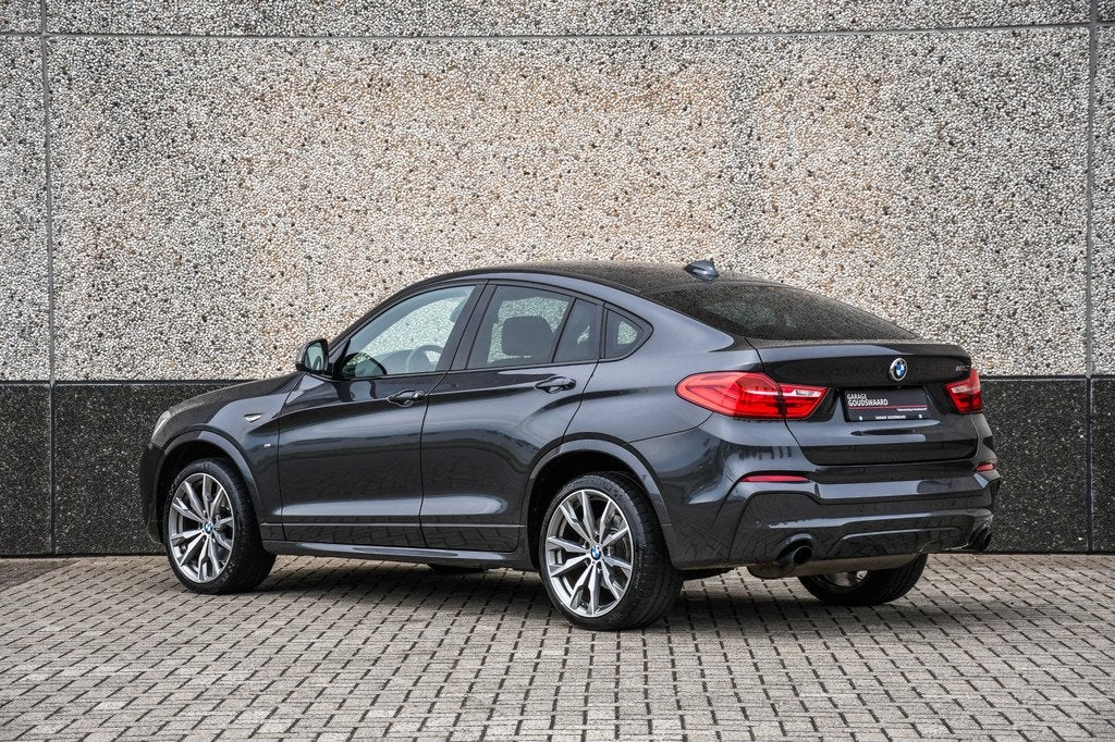 BMW X4 M40i High Executive (bj 2017, automaat), Auto's, BMW, Automaat, Gebruikt, 2000 kg, 1820 kg