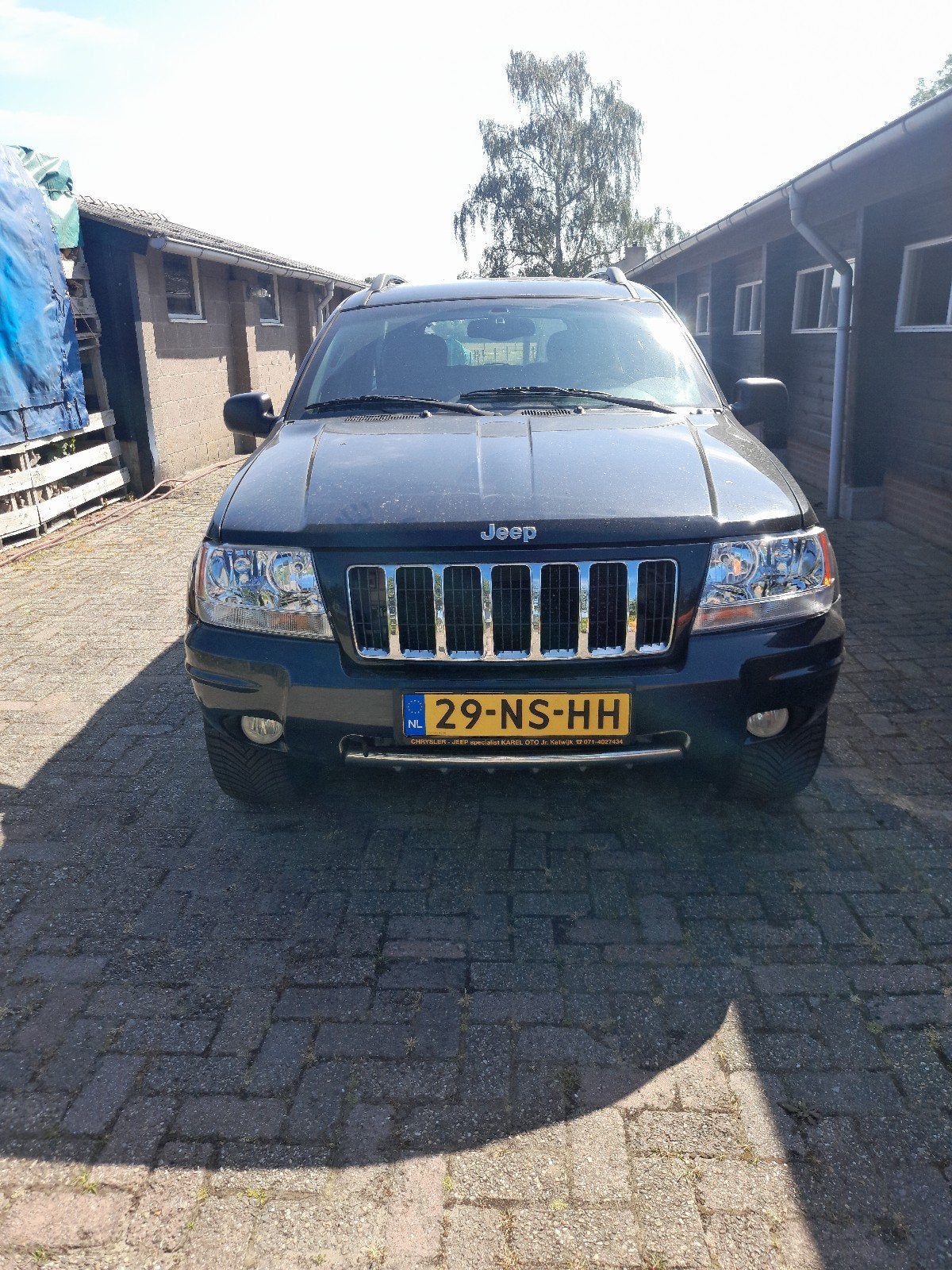 Jeep Grand Cherokee 4.7 I V8 Overland AUT 2004 Zwart, Auto's, Automaat, 8 cilinders, 258 pk, 3360 kg