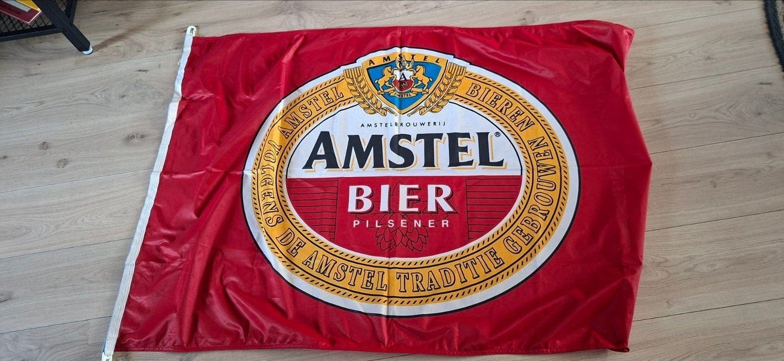 Originele Amstelbier vlag, Ophalen