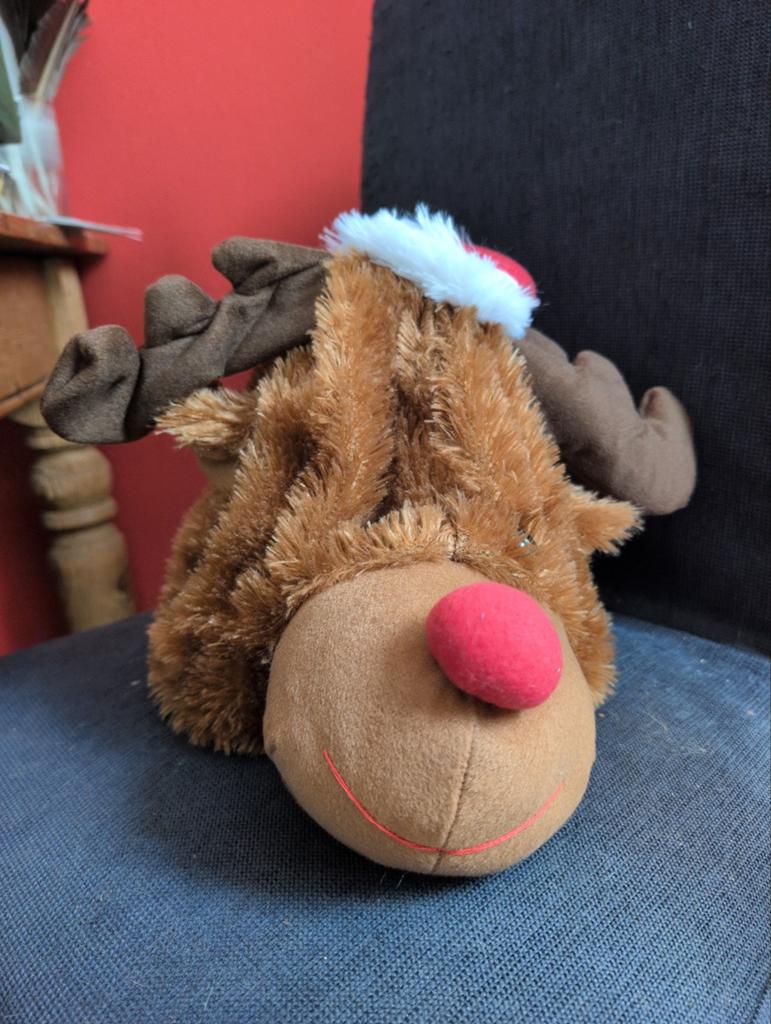 Kerstmuts zingend en bewegend, Ophalen