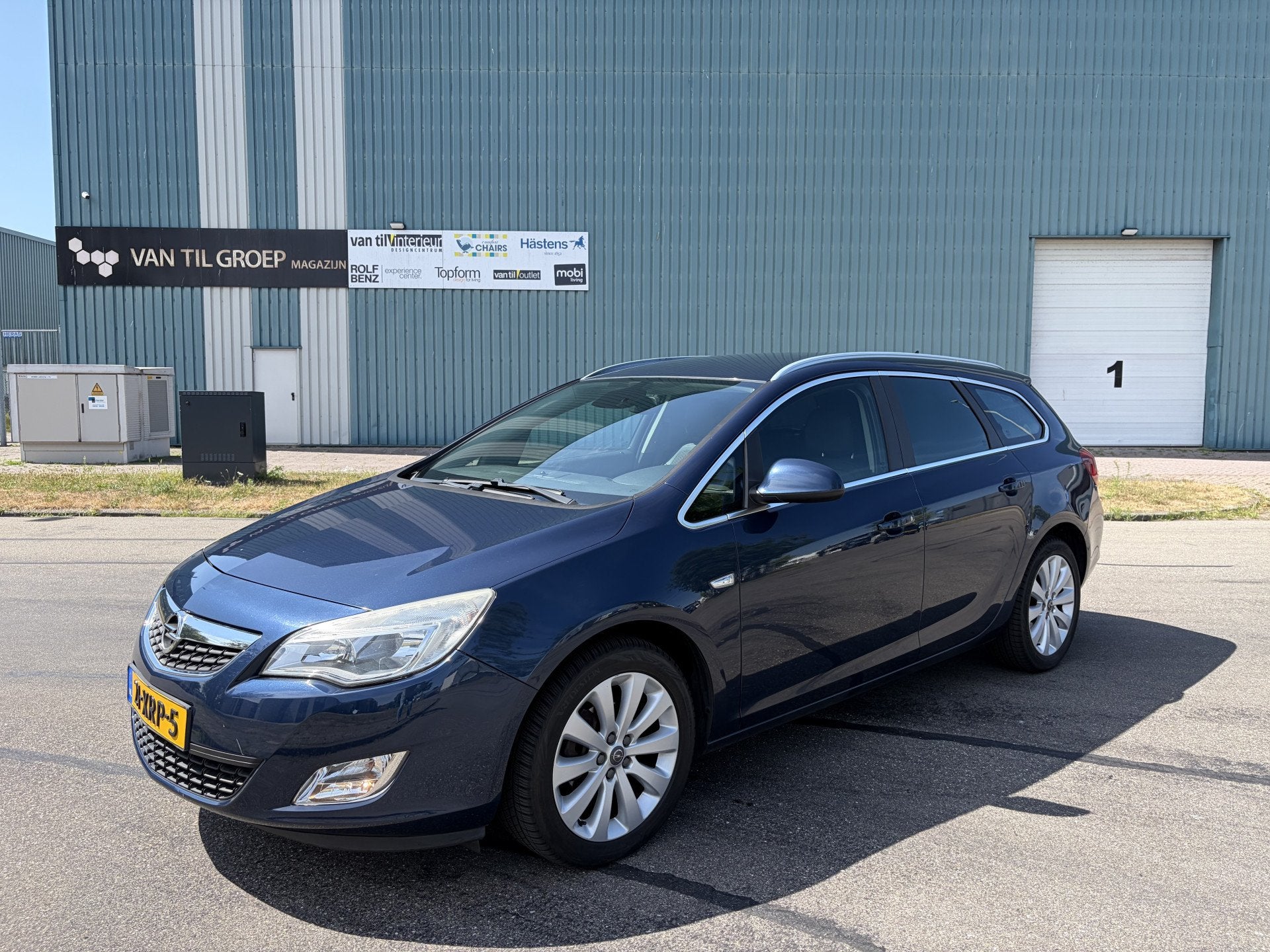 Opel Astra Sports Tourer 1.4i Turbo Cosmo 6-Bak 120 PK. Mooi, Auto's, Voorwielaandrijving, Euro 5, Gebruikt, Zwart