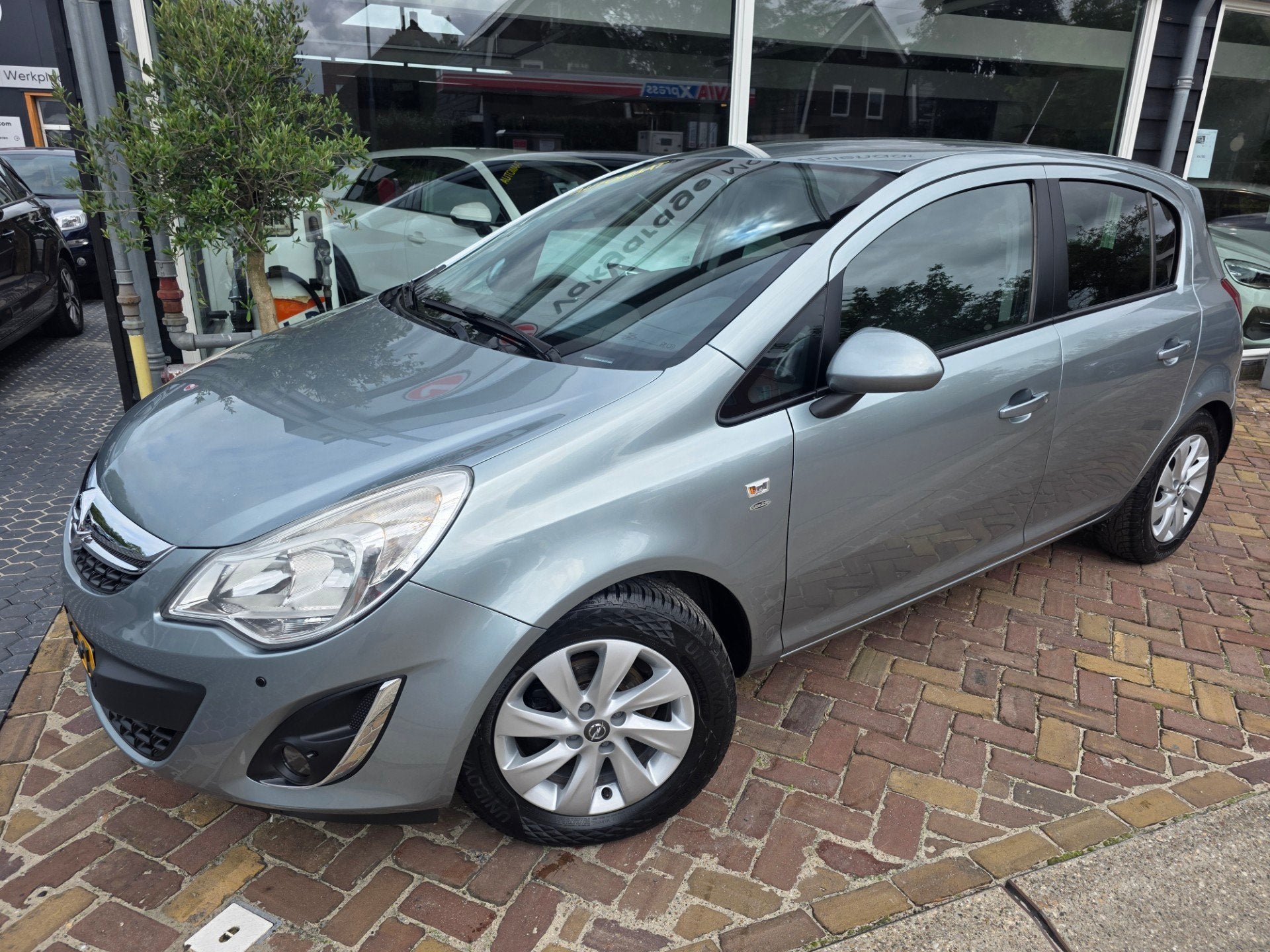 Opel CORSA 1.4-16V Cosmo,volautomaat,pdc, Auto's, Euro 5, 101 pk, Gebruikt, 1398 cc