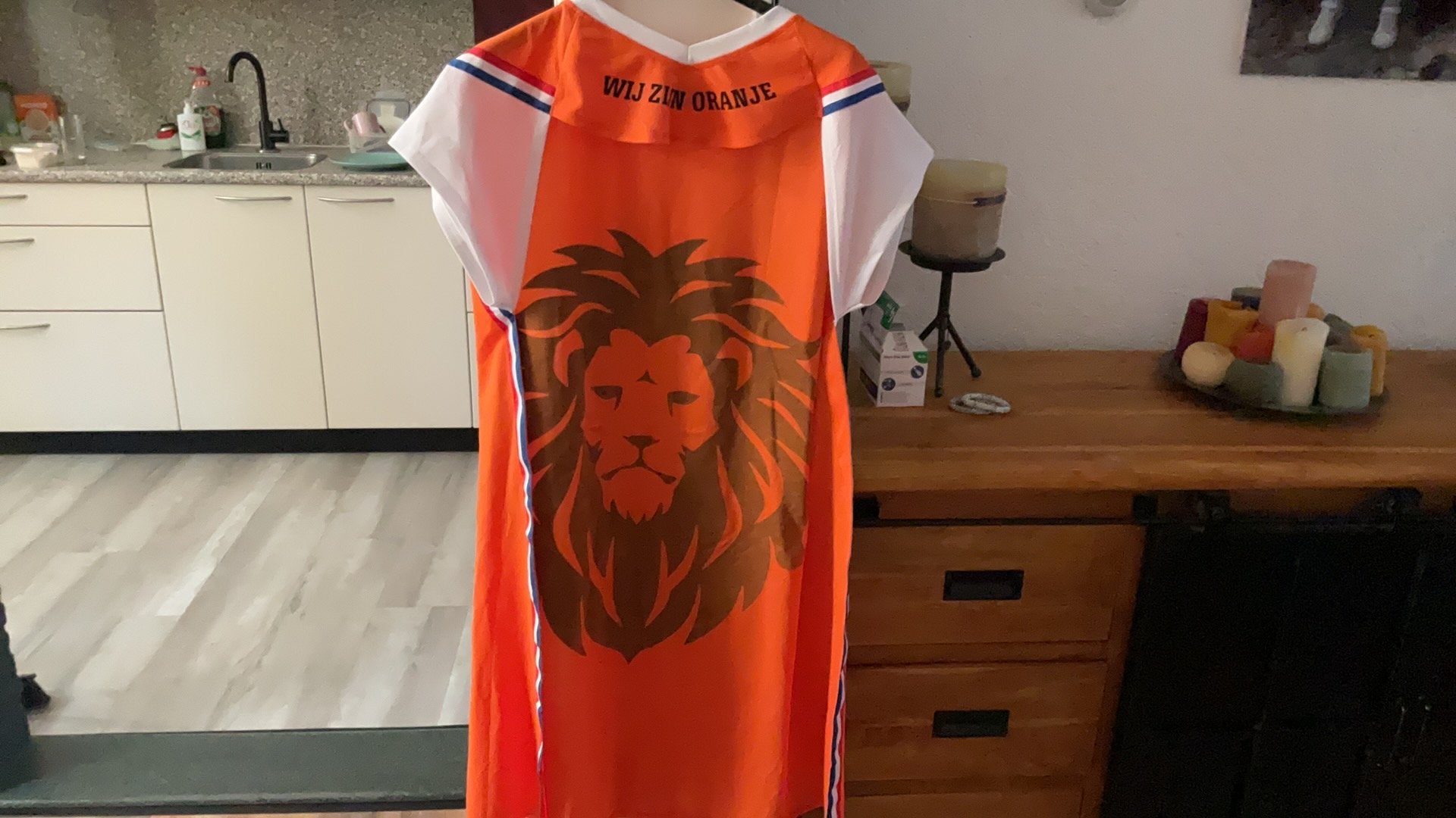 Oranje cape, Ophalen, Zo goed als nieuw