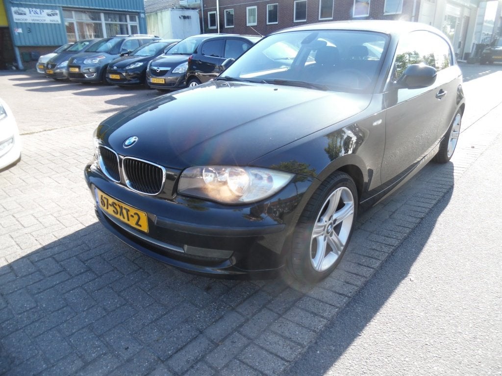 BMW 1-serie apk 7.27 118i Business Line airco (bj 2011), 1-Serie, Euro 5, 4 stoelen, Zwart