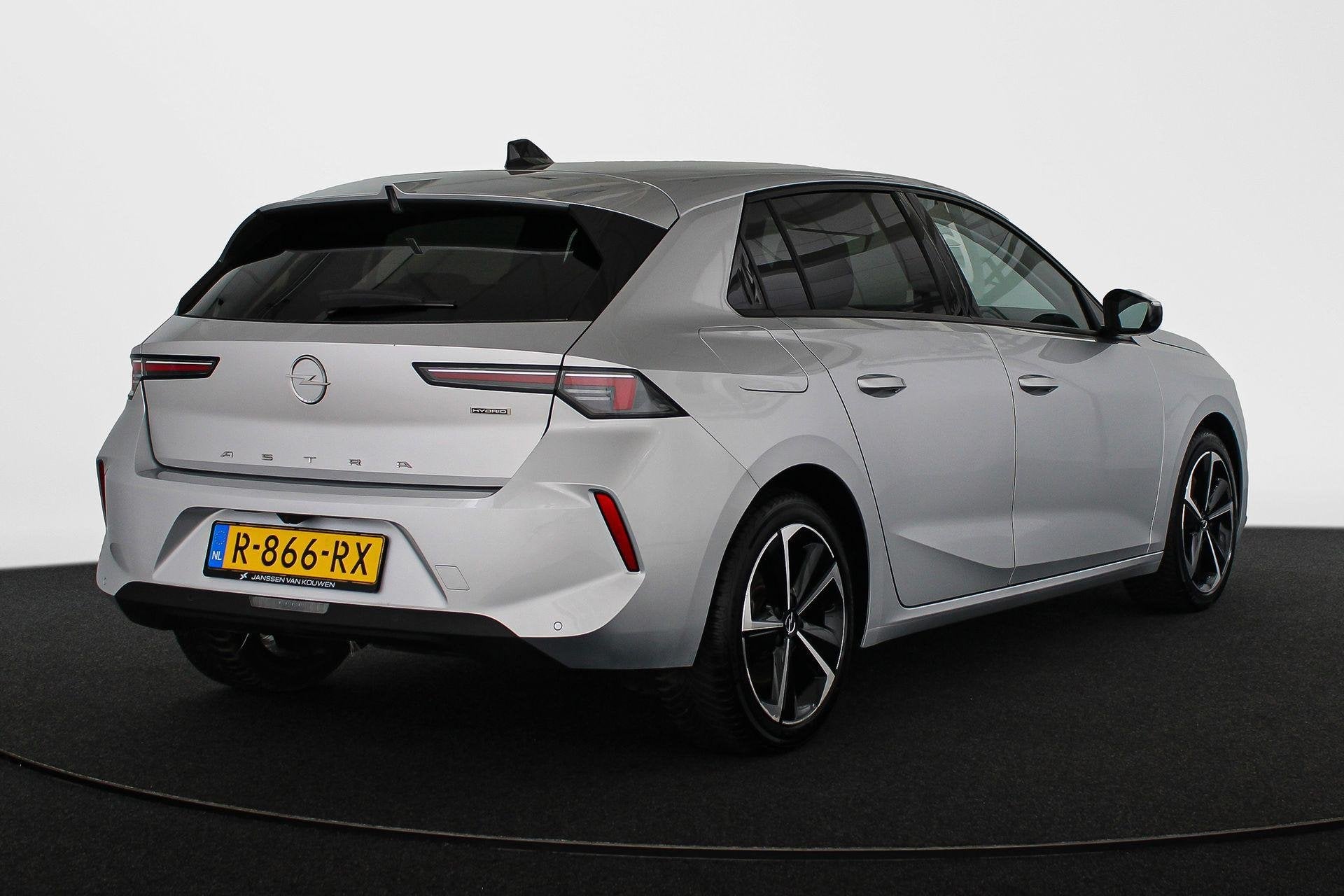 Opel Astra 1.6 Hybrid Business Edition Navi Pro Apple CarPla, Auto's, Stof, Gebruikt, 4 cilinders, 181 pk