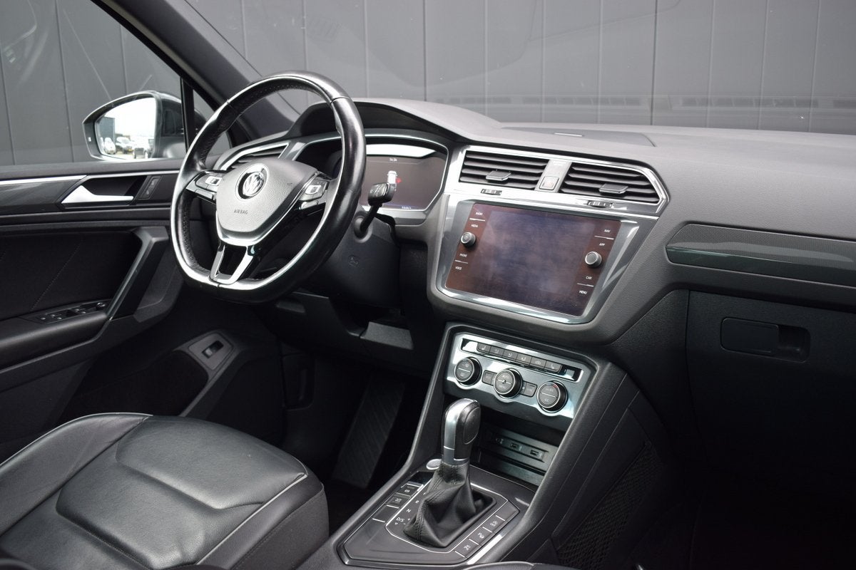 Volkswagen Tiguan 1.4 TSI Automaat Highline R-Line Virtual |, 4 cilinders, Zwart, Verwarmde buitenspiegels, SUV of Terreinwagen