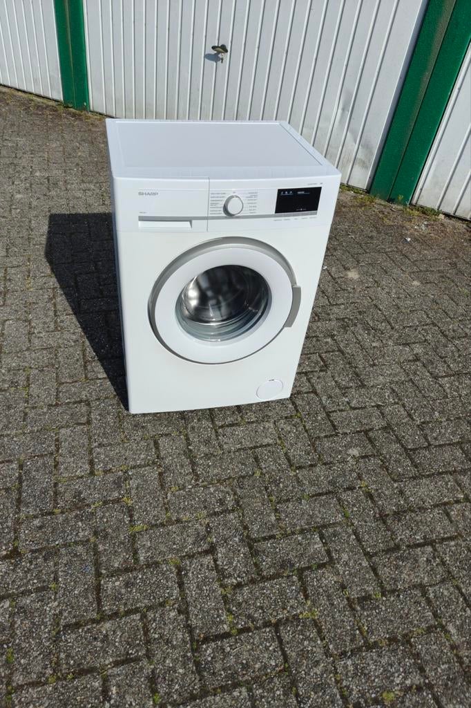 Sharp wasmachine 1400 RPM 7kg A klasse in prima staat., Ophalen, Zo goed als nieuw, Voorlader, 85 tot 90 cm