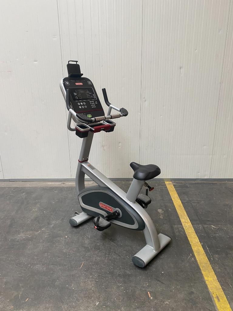 Star Trac binnen fiets Upright bike (4 beschikbaar), Ophalen, Gebruikt, Metaal, Benen