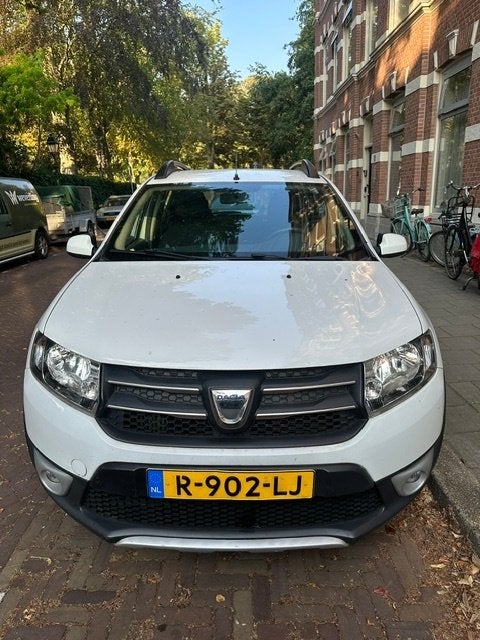 Dacia Sandero 0.9 TCE 66KW Stepway 2016 Wit, Auto's, Dacia, Voorwielaandrijving, 898 cc, Stof, 40 €/maand