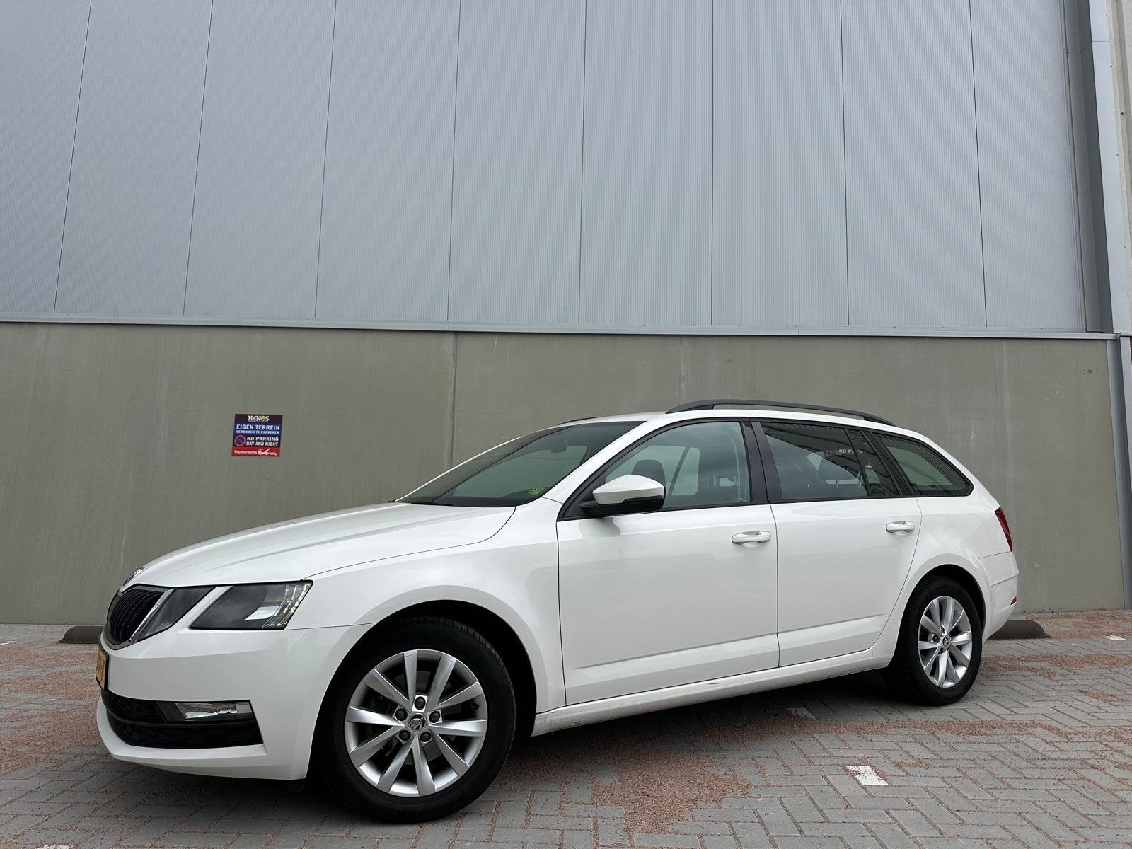 Skoda Octavia Combi 1.0 TSI Greentech Ambition Business Clim, Stof, Gebruikt, Met garantie (alle), 116 pk