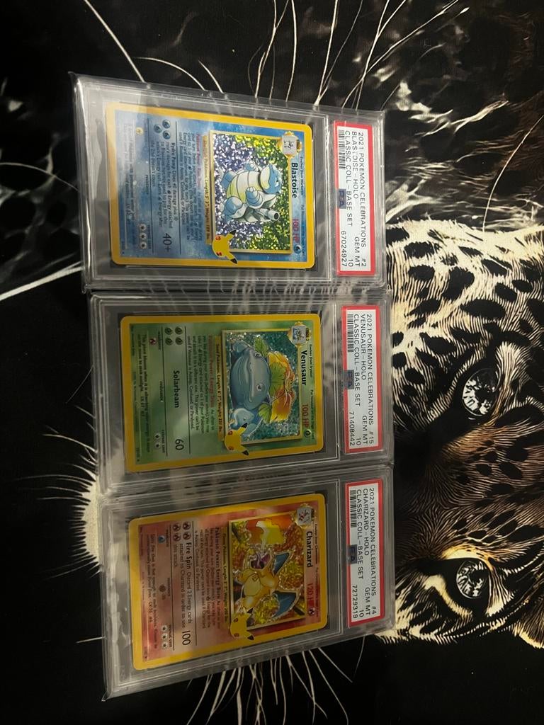 PSA 10 Charizard, Blastoise, Venusaur Celebrations Set, Ophalen of Verzenden, Nieuw, Meerdere kaarten