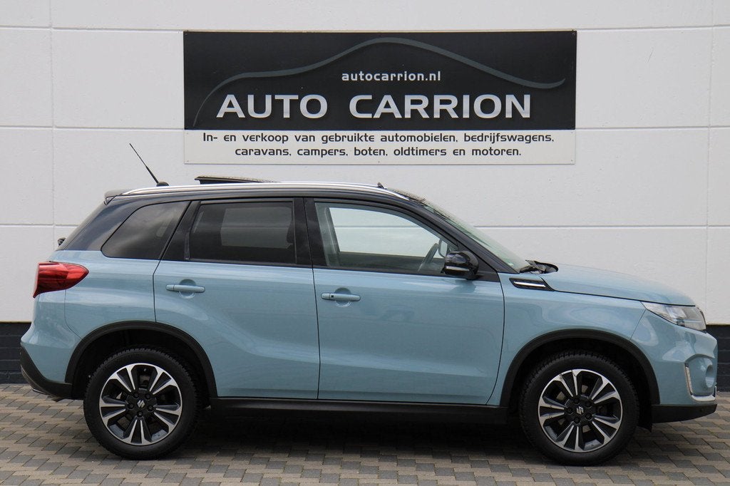 Suzuki Vitara 1.4 140PK AllGrip 4X4 Panoramadak Carplay luxe, Auto's, Suzuki, Gebruikt, Zwart, 4 cilinders, 129 pk