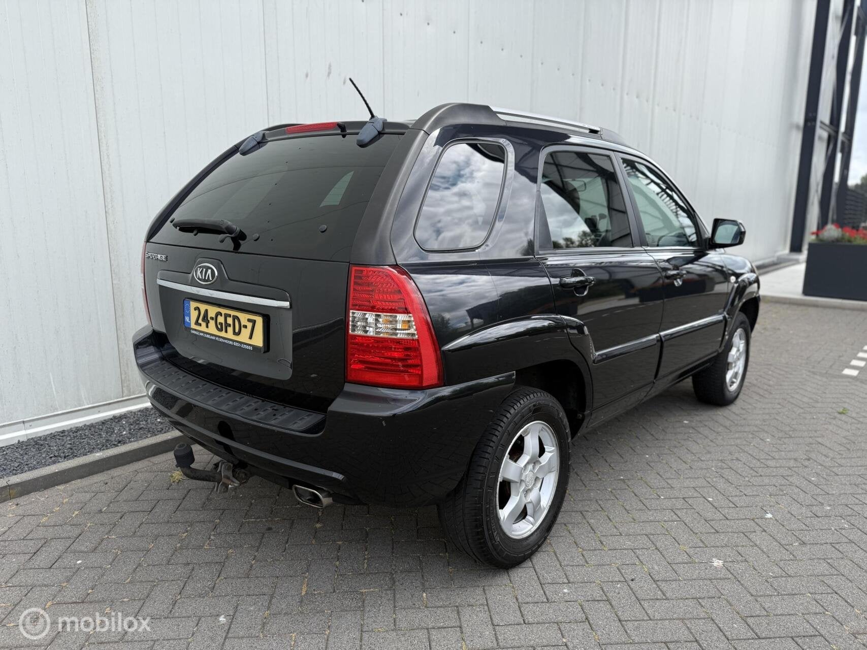 Kia Sportage 2.0 X-ception Airco Trekhaak Stoelverwarming, Auto's, Kia, 1442 kg, Gebruikt, 4 cilinders, Zwart