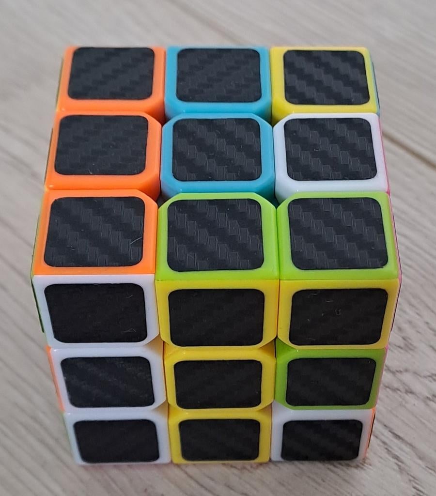 Rubik's Kubus Carbon Fiber Look - Puzzelplezier, Ophalen of Verzenden, Zo goed als nieuw, Puzzelen