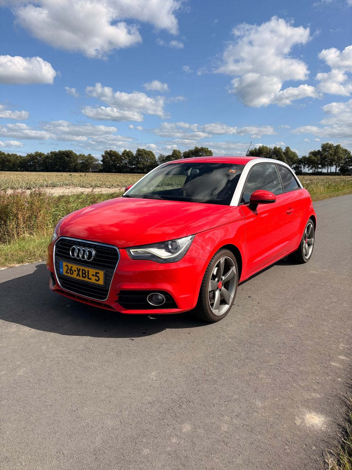 Audi A1 1.6 TDI 2012 Rood, Voorwielaandrijving, Euro 5, A1, Zwart