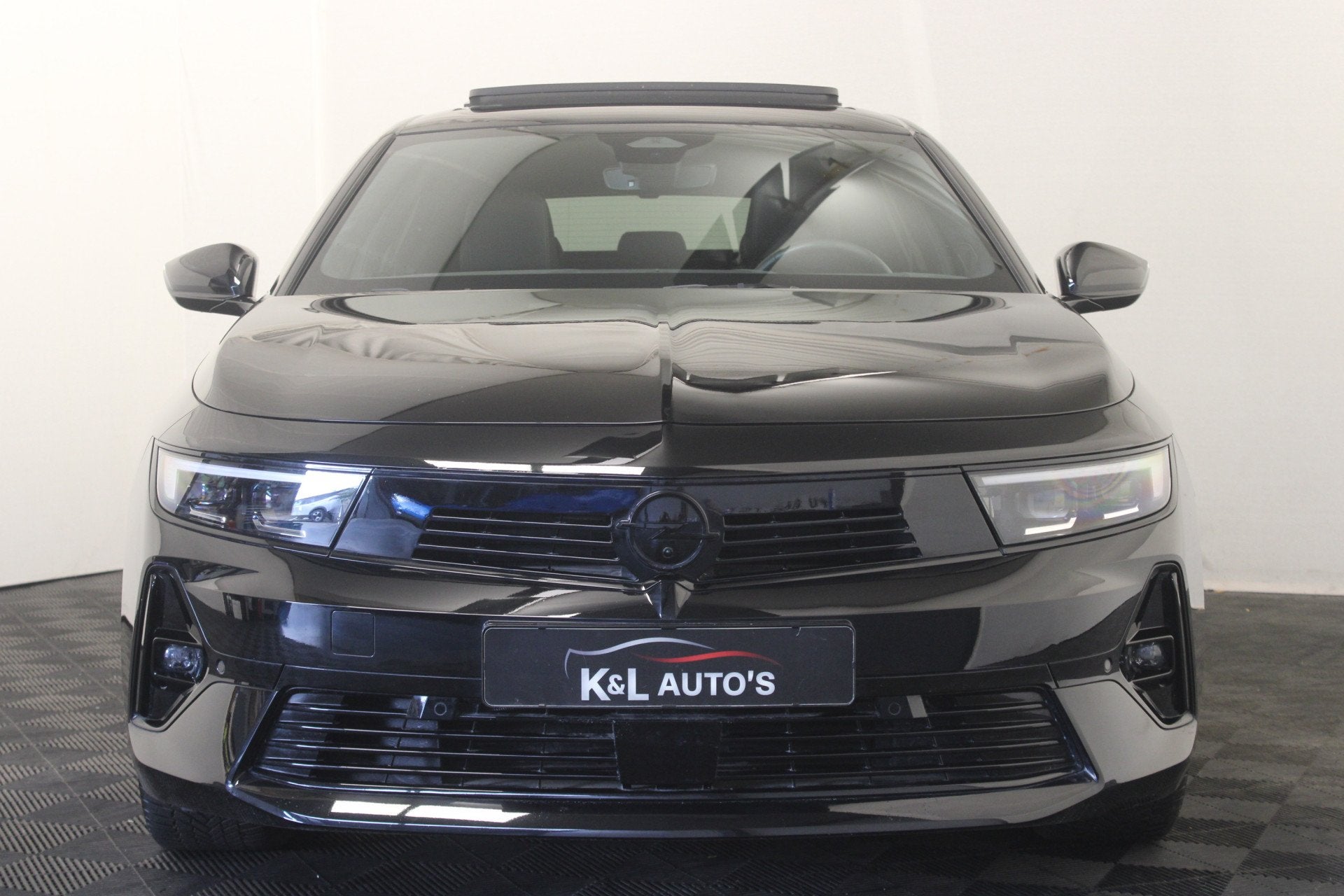 Opel Astra 1.2 Turbo Ultimate |Pano|Stoel/stuur verw.|Camera, Gebruikt, Zwart, 1199 cc, Zwart