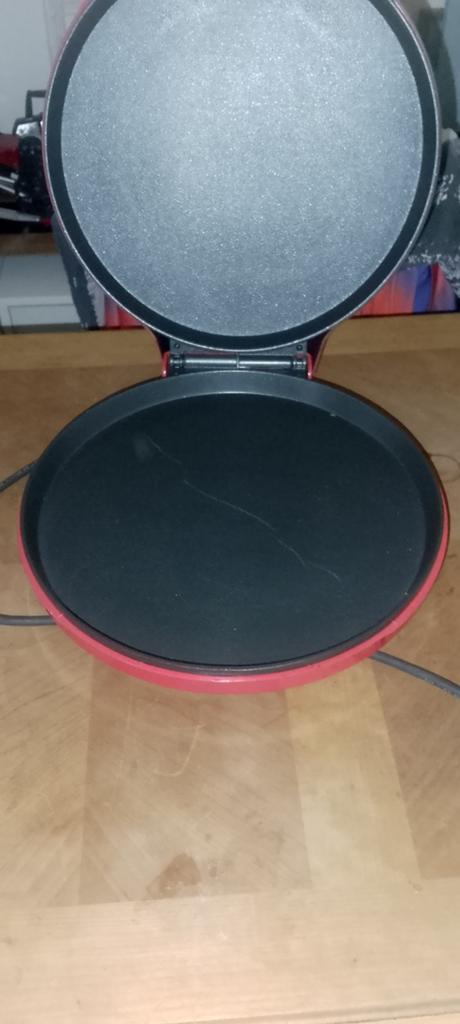 Pizza pan, Ophalen, Zo goed als nieuw