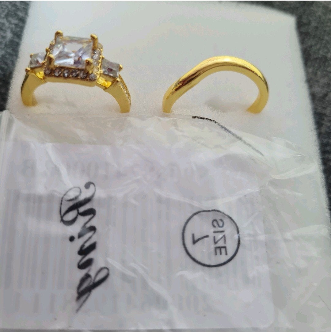 Set van twee goudkleurige ringen 17 mm. Maat 7., Overige materialen, Nieuw, Ophalen of Verzenden, 17 tot 18