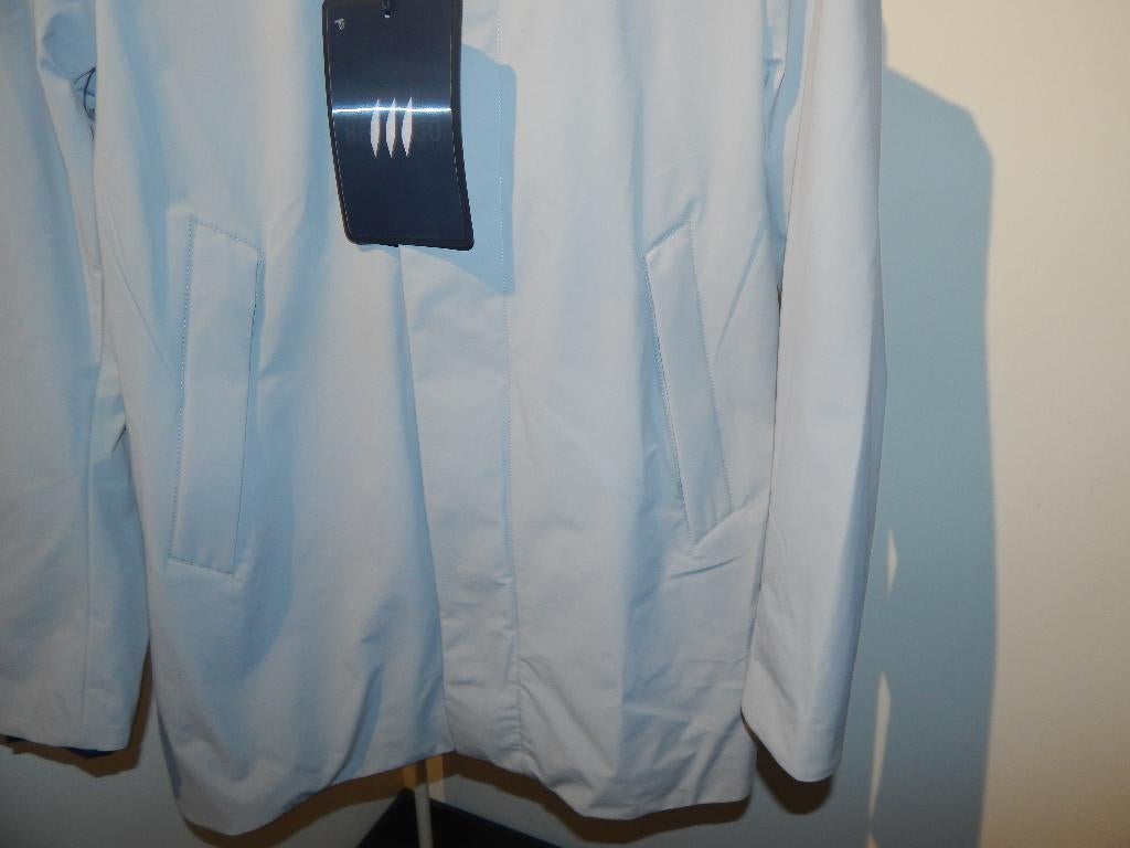Hetrego licht grijze jas Nieuw capuchon en rits mt 50, Hetrego, Nieuw, Grijs, Verzenden