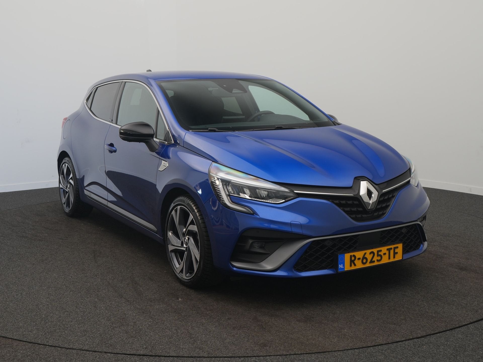 Renault Clio 1.6 E-Tech Hybrid 140 R.S. Line - RIJKLAARPRIJS, Auto's, 4 cilinders, Blauw, 25 km/l, 900 kg