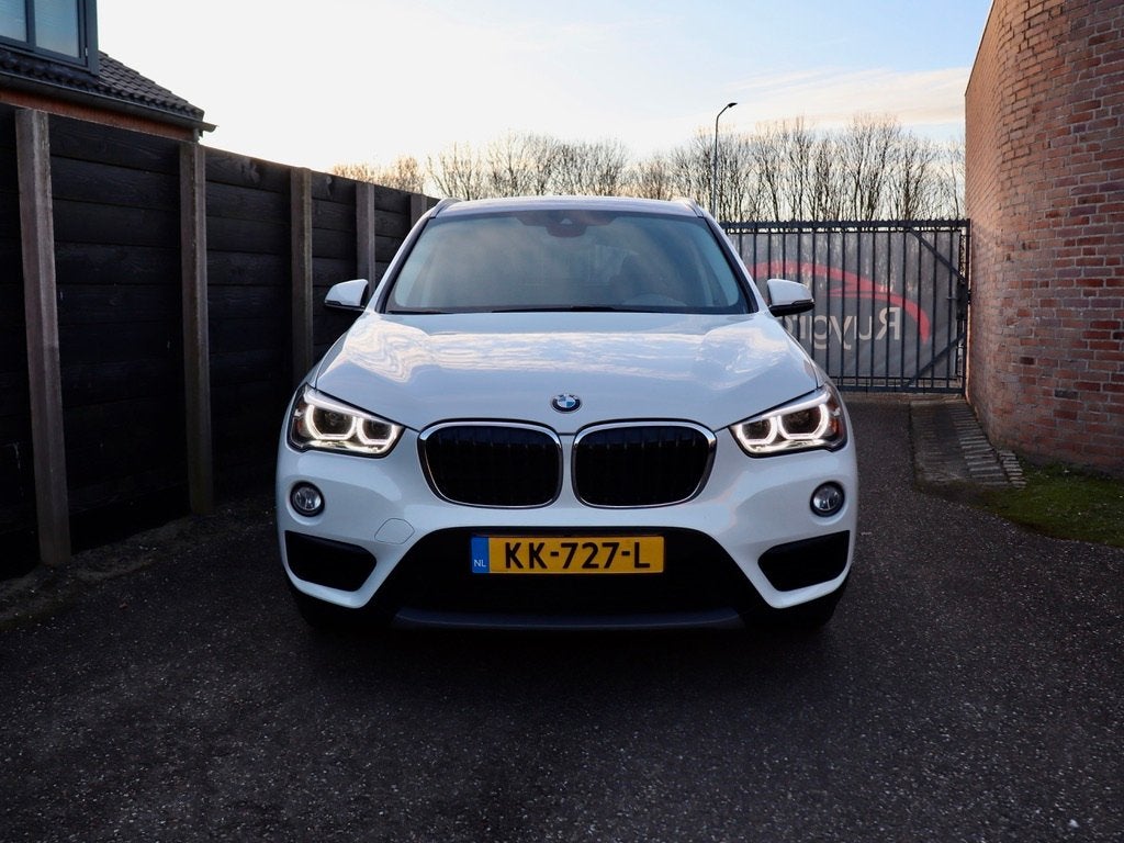 BMW X1 sDrive16d Centennial Executive A tot Z onderhouden, Auto's, Stof, Gebruikt, 116 pk, Wit