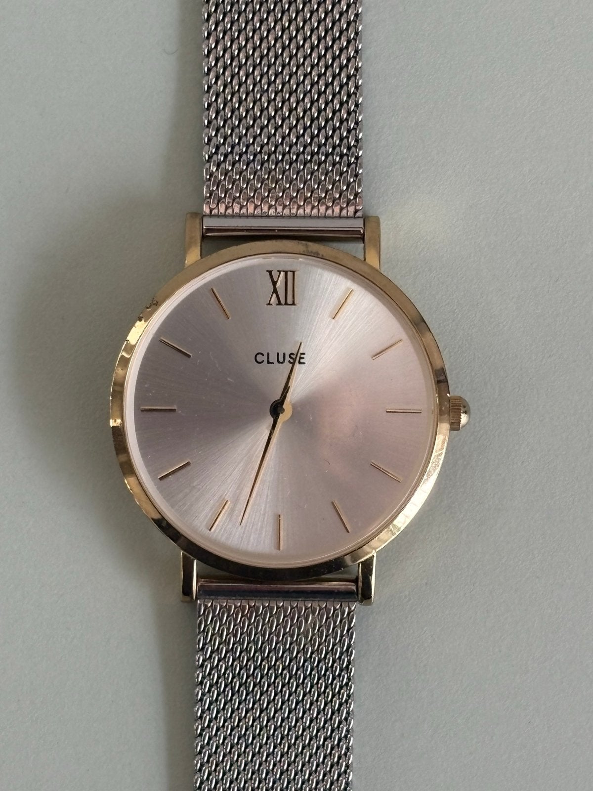 Cluse horloge met goudkleurige kast en zilverkleurige band, Overige merken, Gebruikt, Staal, Polshorloge