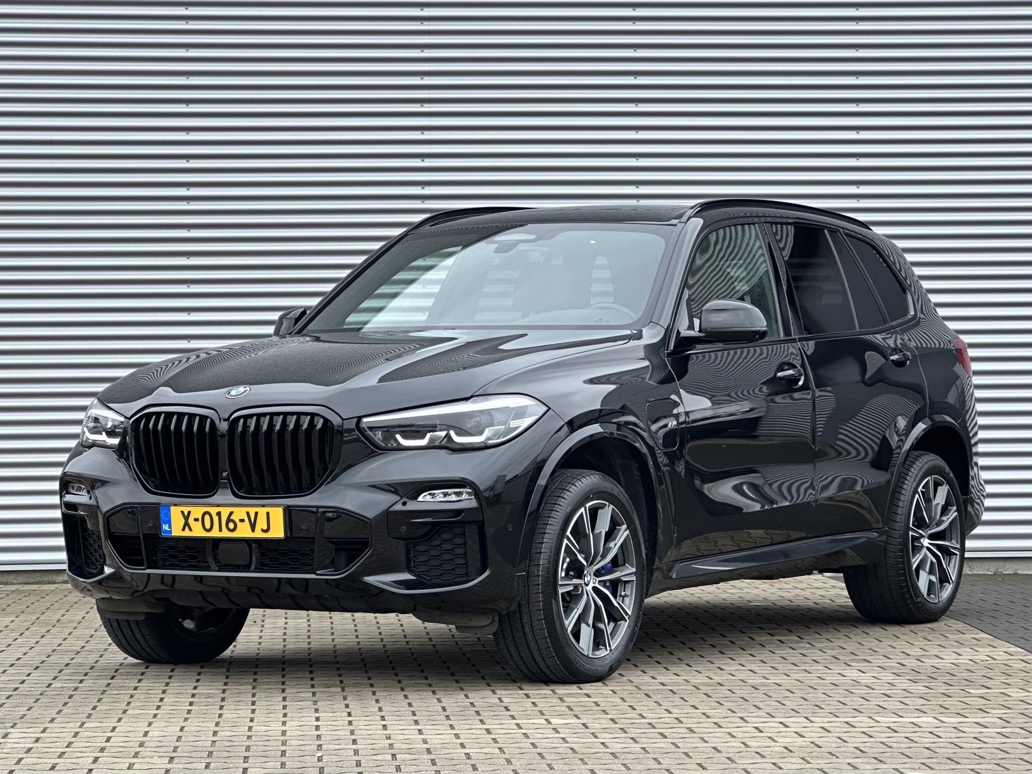BMW X5 xDrive45e High Executive Hedin onderhoud, als nieuw, 77 km/l, Gebruikt, 394 pk, Zwart