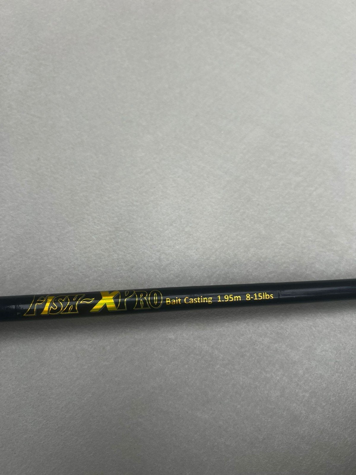 FishXPro Baitcasting Hengel 1.95m, Ophalen, Zo goed als nieuw, Complete hengel