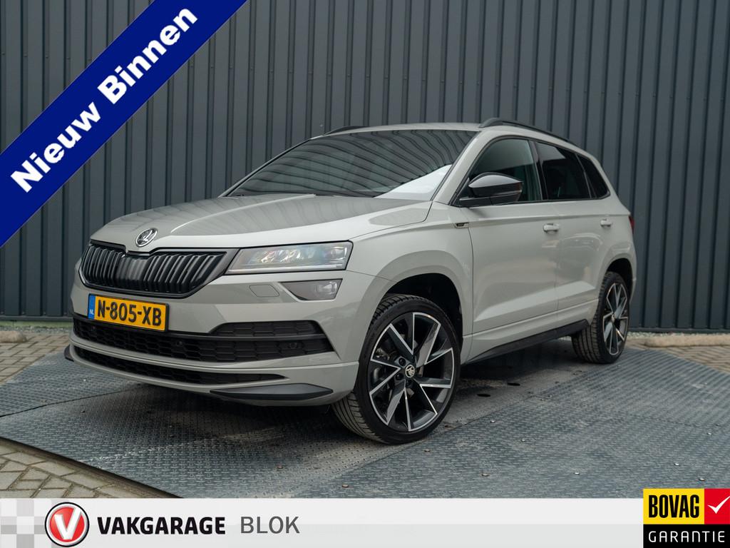 Skoda Karoq 1.5 TSI ACT Sportline Business | Trekhaak wegkl., Auto's, Skoda, Voorwielaandrijving, Stof, 4 cilinders, Handgeschakeld