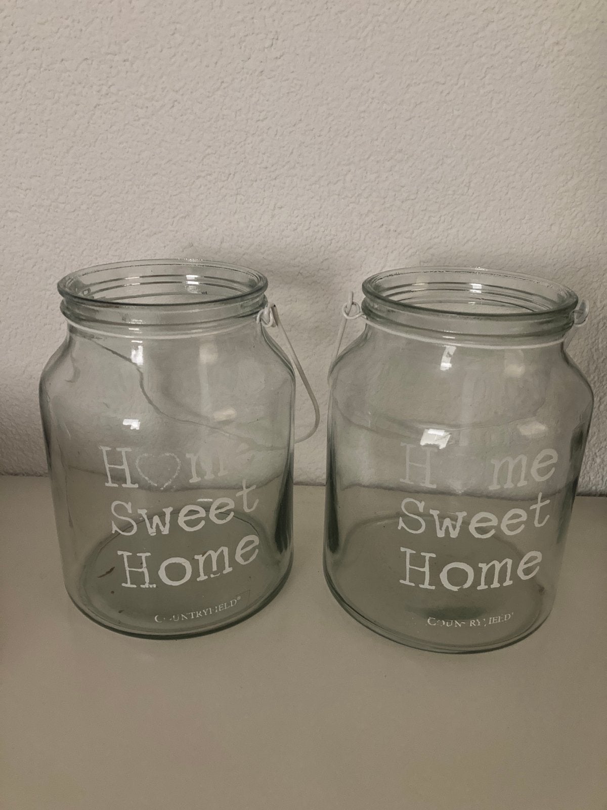 2 glazen windlichten, Huis en Inrichting, Ophalen, Gebruikt, Glas, Windlicht