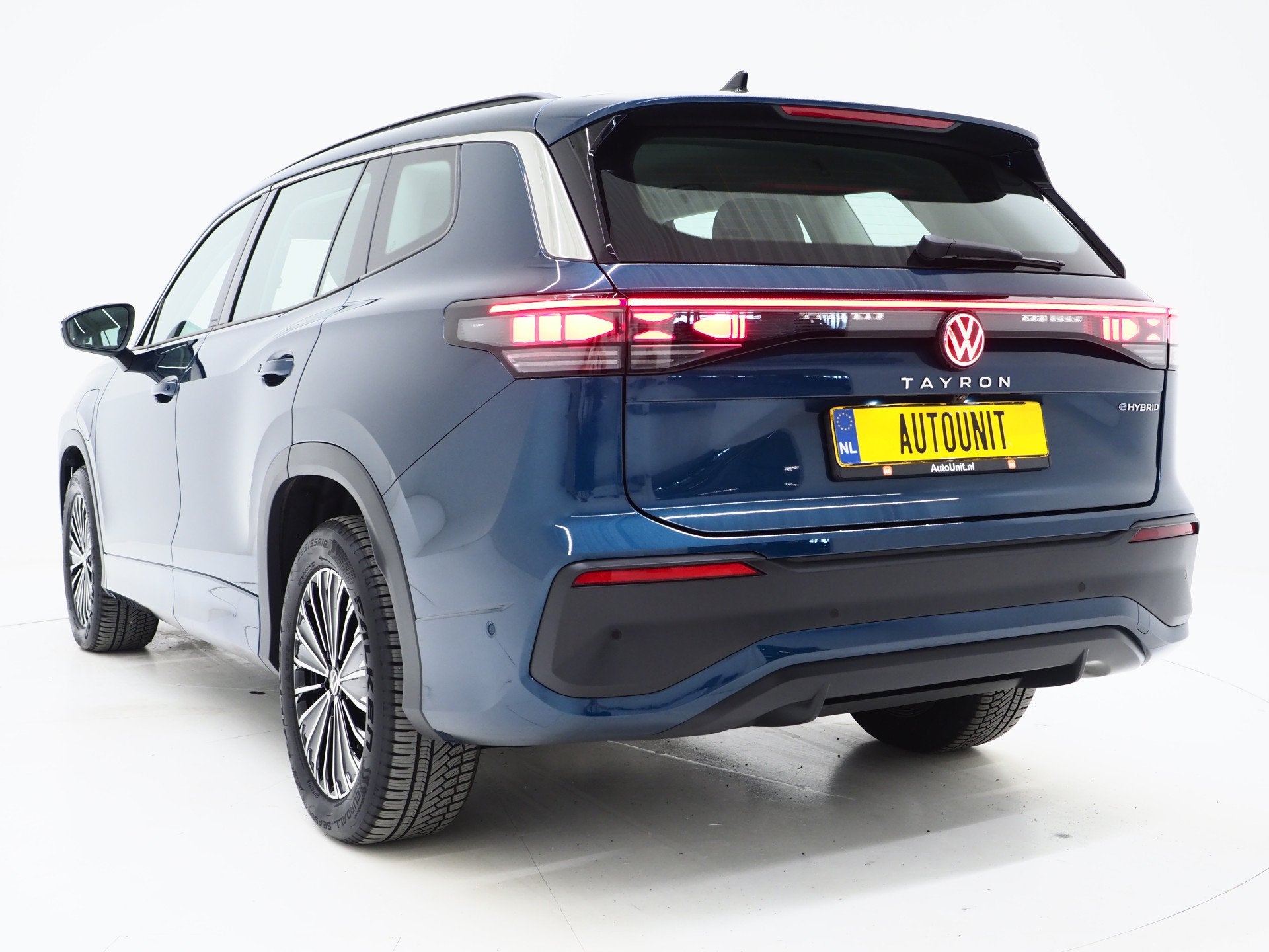 Volkswagen Tayron 1.5 eHybrid | 5 Jaar Garantie | Trekhaak |, Auto's, Zwart, 4 cilinders, Blauw, Leder en Stof