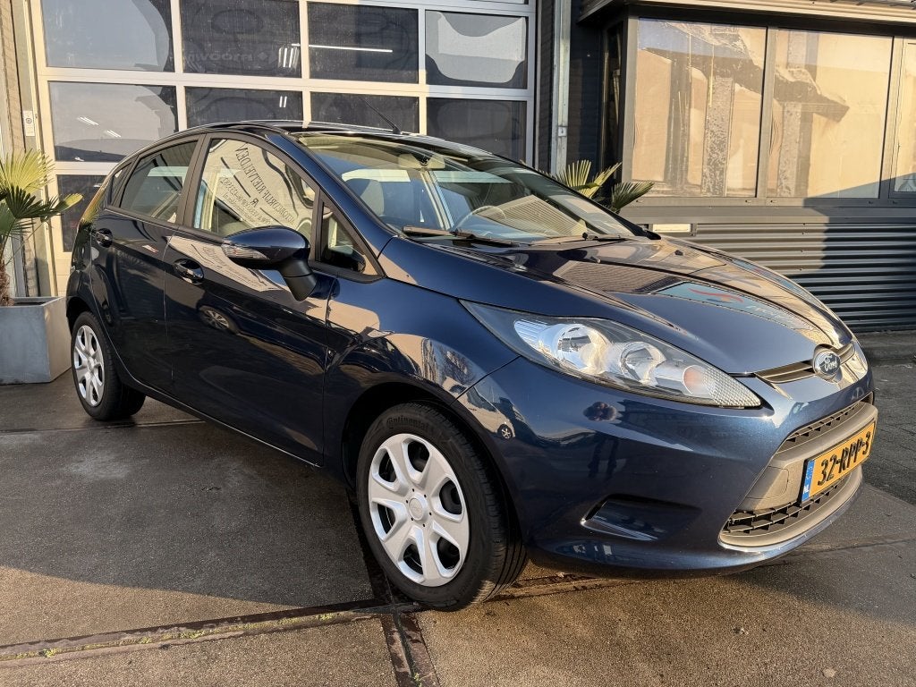 Ford Fiesta 1.25 Limited 5drs Clima Origineel NL NAP! Inruil, Auto's, Euro 5, Stof, 1242 cc, 4 cilinders