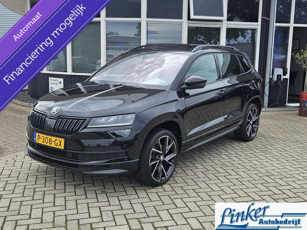 Skoda Karoq 1.5 TSI ACT Sportline Business -PANO TREKHAAK NL, Stof, 4 cilinders, Zwart, Onderhoudsboekje