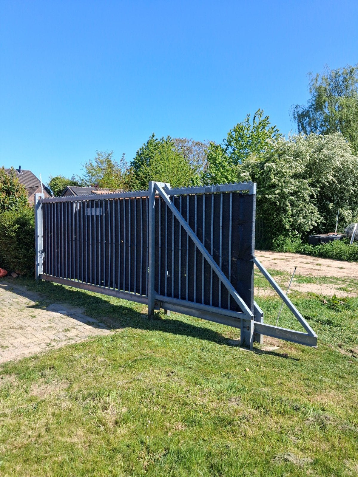 Rol (schuif) poort ijzer., Ophalen