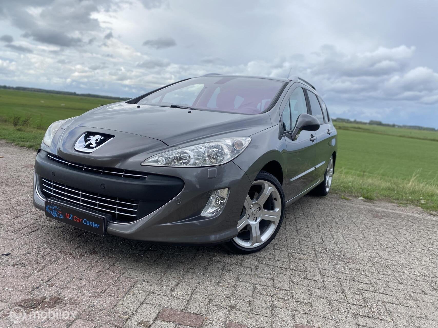 Peugeot 308 SW 1.6 Féline | Pano | Navi | Leder | Cruise, Auto's, Gebruikt, Zwart, 4 cilinders, Verwarmde buitenspiegels
