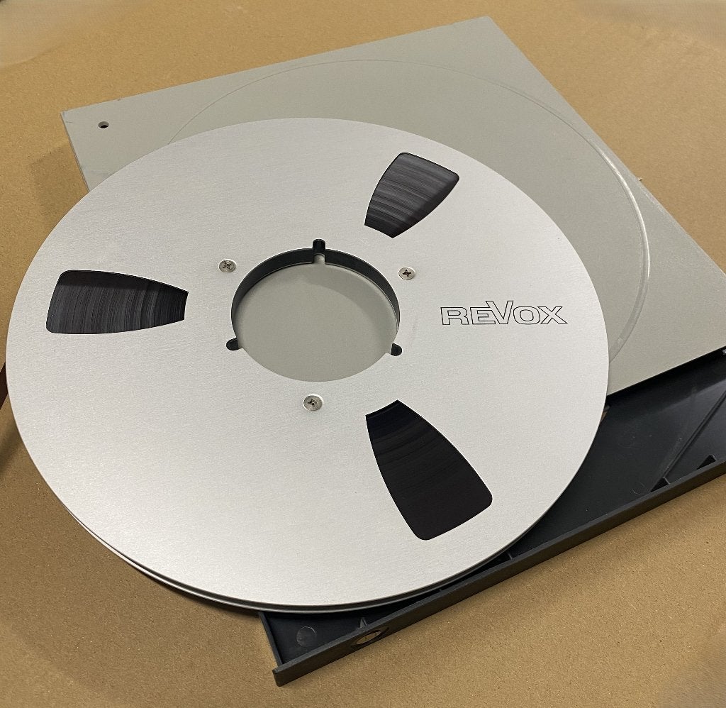 Originele Revox aluminium spoel met tape en cover, Ophalen of Verzenden, Onderdeel, Met stofkap
