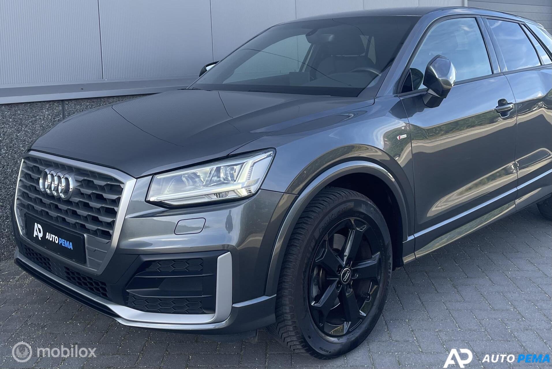 Audi Q2 1.4 TFSI CoD S-tronic 150PK 3xS-Line Led Cc, Gebruikt, 4 cilinders, 150 pk, Leder en Stof