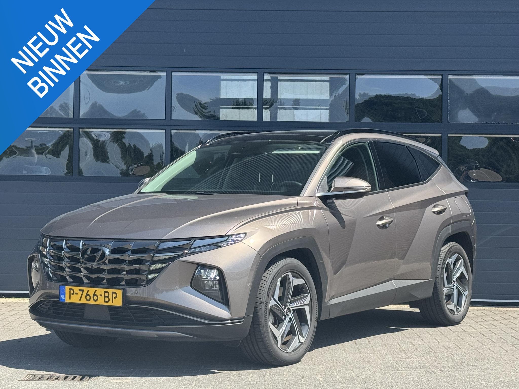 HYUNDAI TUCSON 1.6 T-GDI HEV PREMIUM SKY I SCHUIF/KANTELDAK, Auto's, Gebruikt, 4 cilinders, 1650 kg, Origineel Nederlands