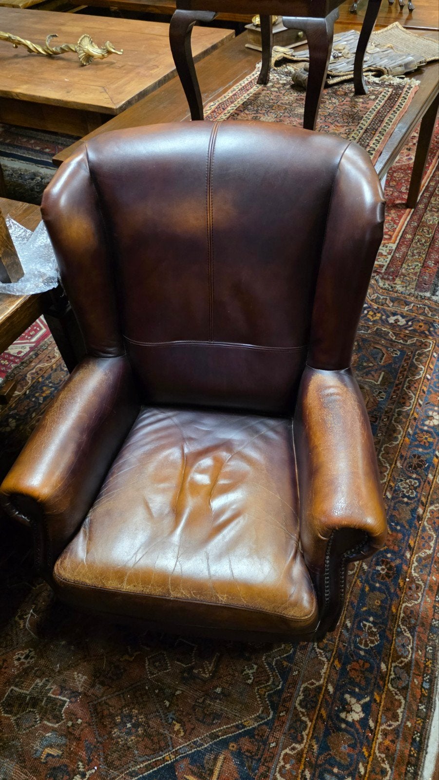 Lederen oorfauteuil, Ophalen